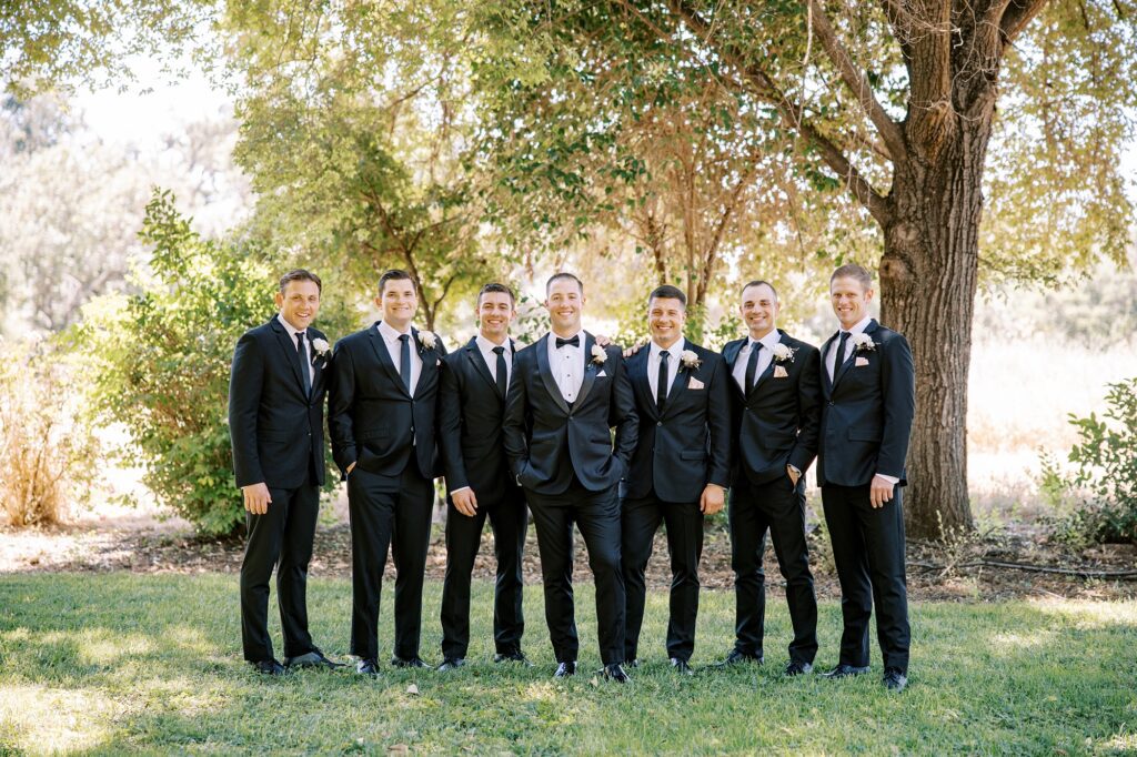 All groomsmen in black at Lamoure Vineyard wedding at Le Reve Estate by Pismo Beach wedding photographer Austyn Elizabeth Photography