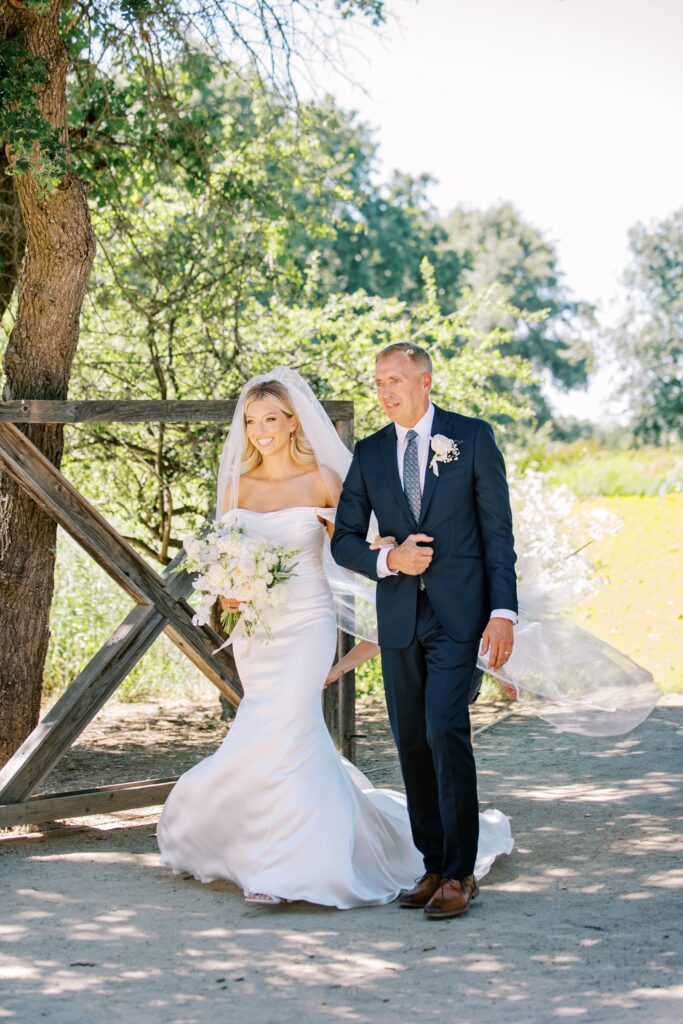 Bride walks down aisle at Lamoure Vineyard wedding by Pismo Beach wedding photographer Austyn Elizabeth Photography