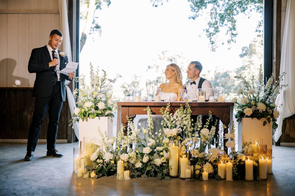 Toasts at Lamoure Vineyard wedding by San Luis Obispo wedding photographer Austyn Elizabeth Photography