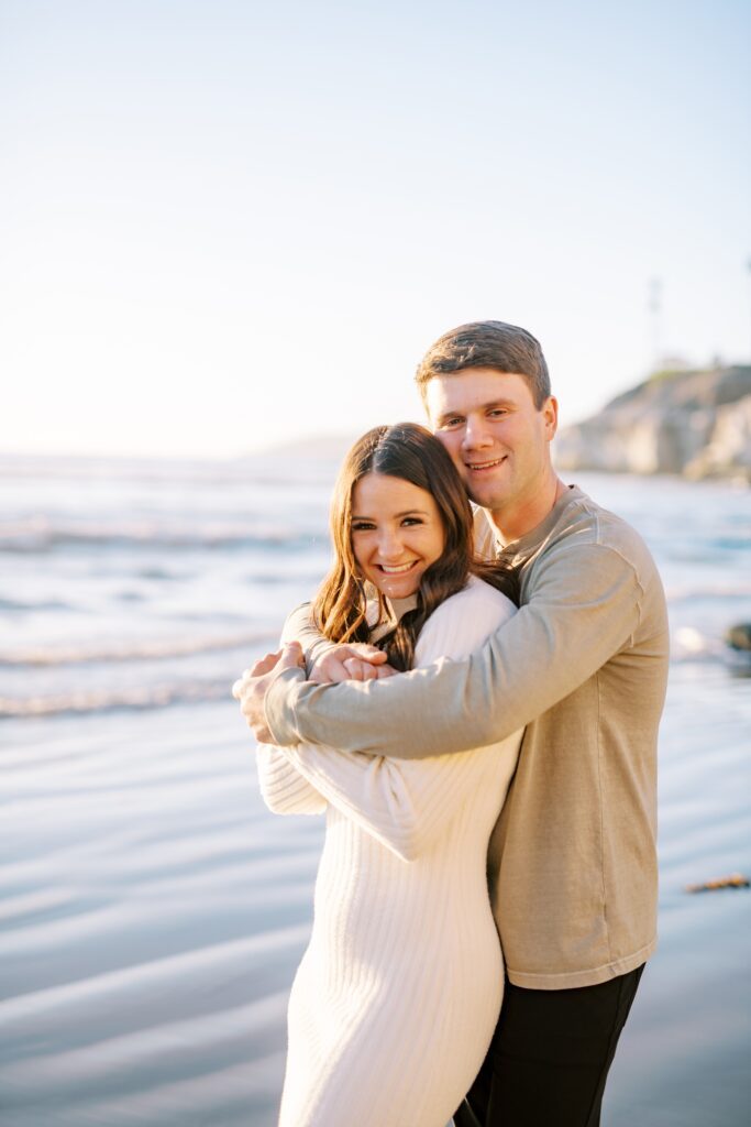 Couple stand with smiles at Central Coast Engagement session by Pismo Beach Engagement Photographer Austyn Elizabeth Photography