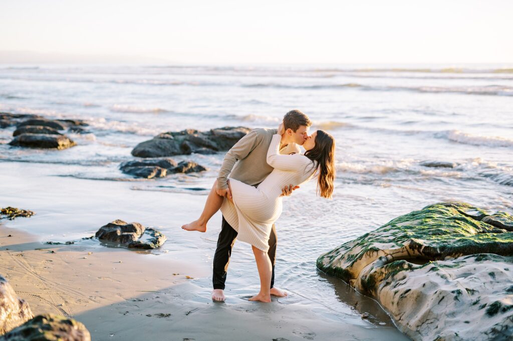 Guy dips his girlfriend at Pismo Beach Engagement session by Pismo Beach Wedding Photographer Austyn Elizabeth Photography