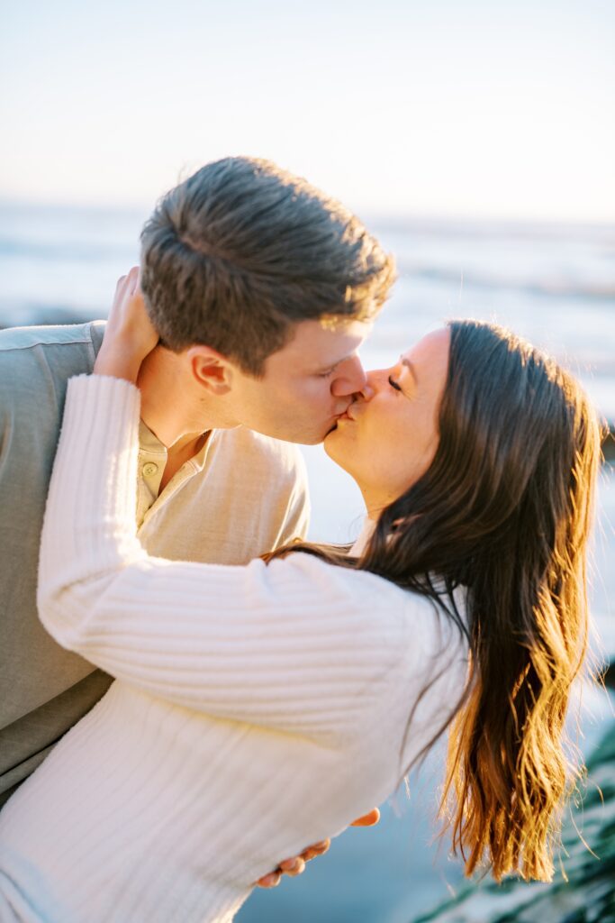 Guy dips the girl and kisses at Pismo Beach Engagement session by Pismo Beach Wedding Photographer Austyn Elizabeth Photography