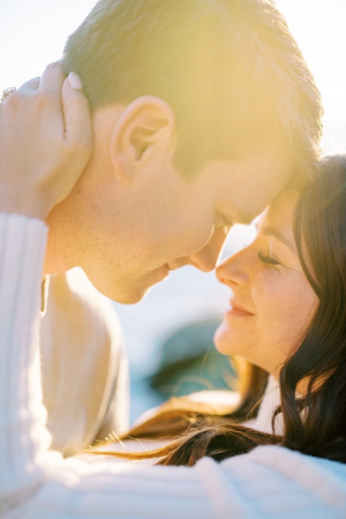 couple press foreheads against each other at Pismo Beach Engagement session by Pismo Beach Wedding Photographer Austyn Elizabeth Photography