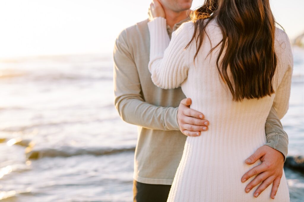 Couple embrace at Pismo Beach Engagement session by Pismo Beach Engagement Photographer Austyn Elizabeth Photography