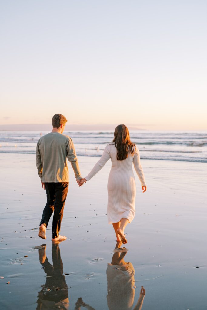 Couple walk at Pismo Beach Engagement session by Pismo Beach Wedding Photographer Austyn Elizabeth Photography