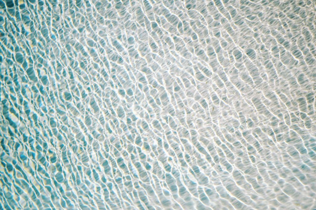 Cool teal blue pool acted as color pallet at hawaiian wedding held at Villa Leche wedding by Palm Springs Wedding Photographer Austyn Elizabeth Photography