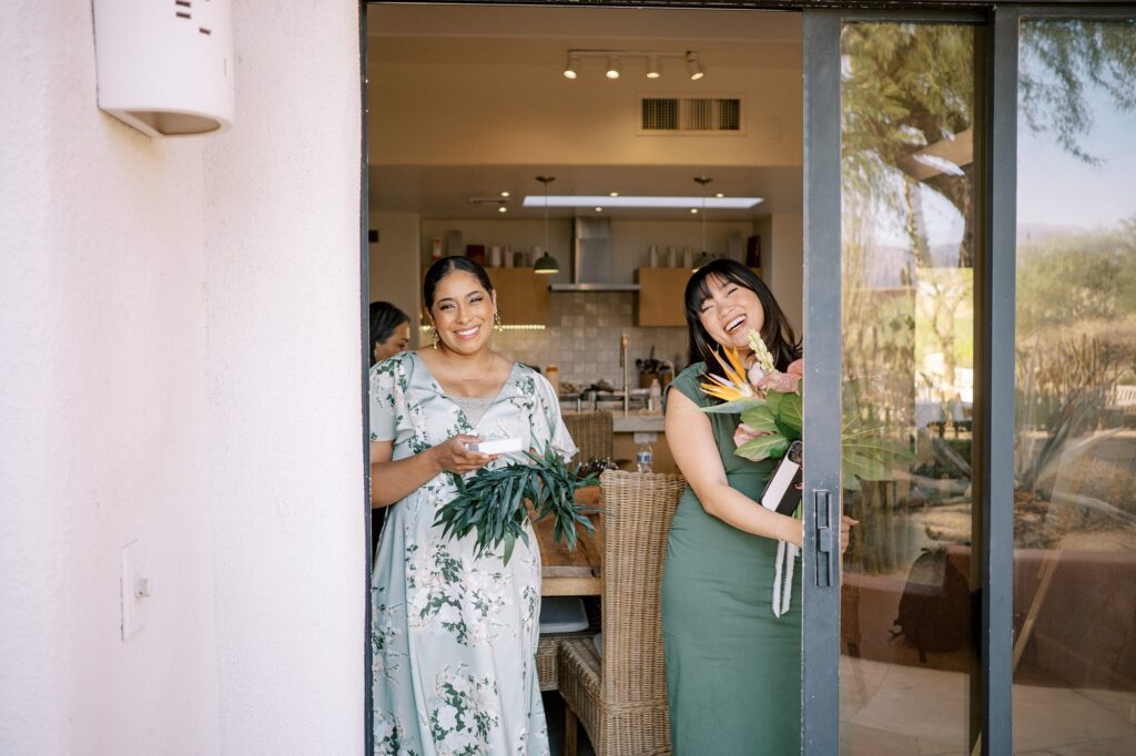Mom and bridesmaid in green with florals at Villa Leche wedding by Palm Springs Wedding Photographer Austyn Elizabeth Photography