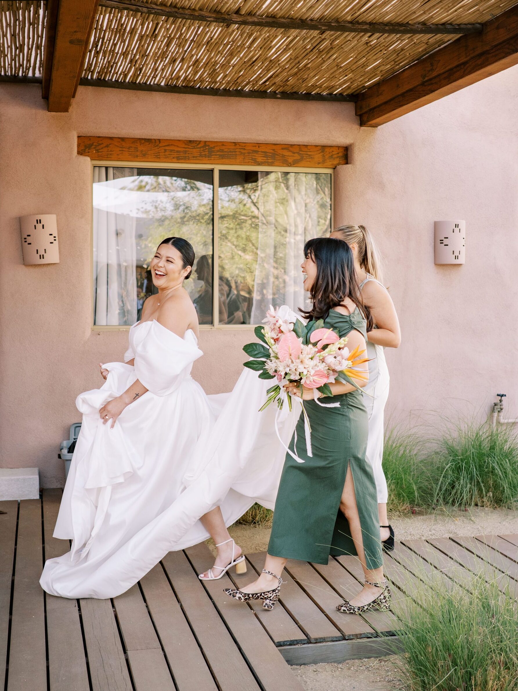Bride walking into suite at Villa Leche wedding by Palm Springs Wedding Photographer Austyn Elizabeth Photography