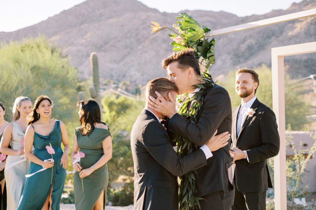 Groom kisses groomsmen's forehead at Villa Leche wedding by Palm Springs Wedding Photographer Austyn Elizabeth Photography