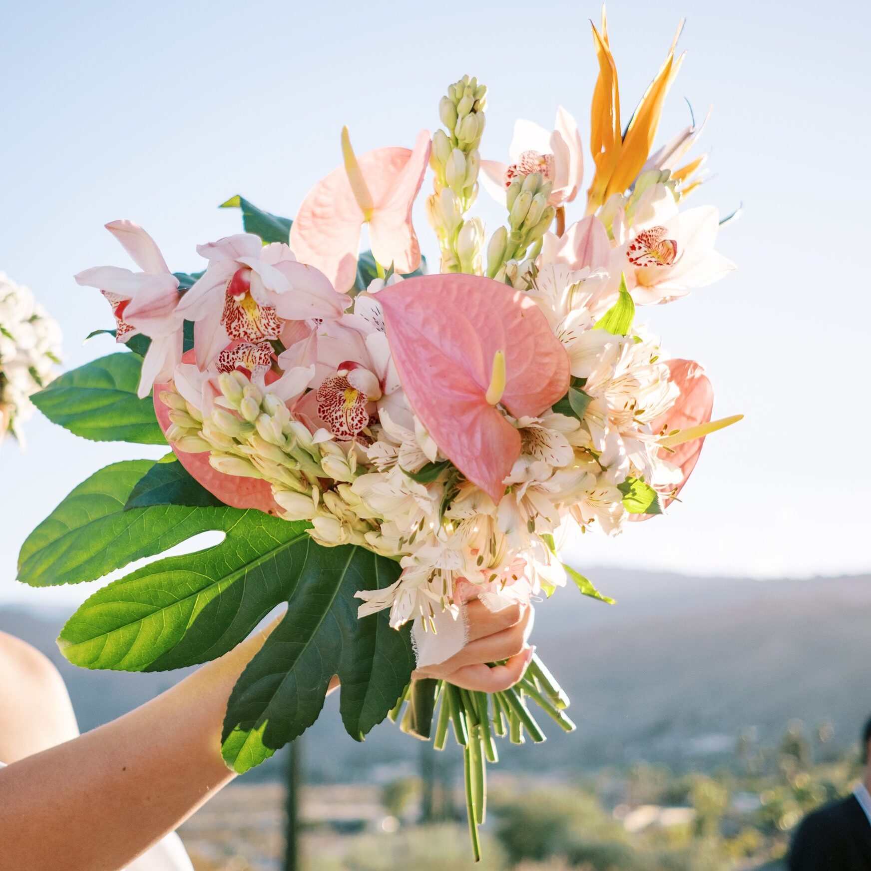 Hawaiian inspired bridal bouquet at hawaiian Palm Springs wedding at Villa Leche wedding by Palm Springs Wedding Photographer Austyn Elizabeth Photography
