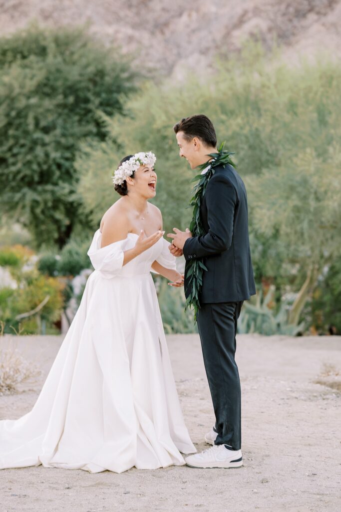 Bride in shock looking at groom at Villa Leche wedding by Palm Springs Wedding Photographer Austyn Elizabeth Photography