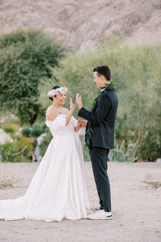 Groom showing bride his wedding ring at Villa Leche wedding by Palm Springs Wedding Photographer Austyn Elizabeth Photography