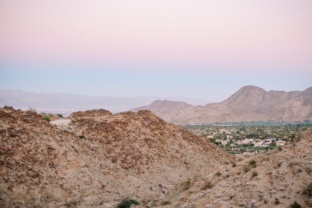 Palm Desert hills at dusk with pink skies at Villa Leche wedding by Palm Springs Wedding Photographer Austyn Elizabeth Photography