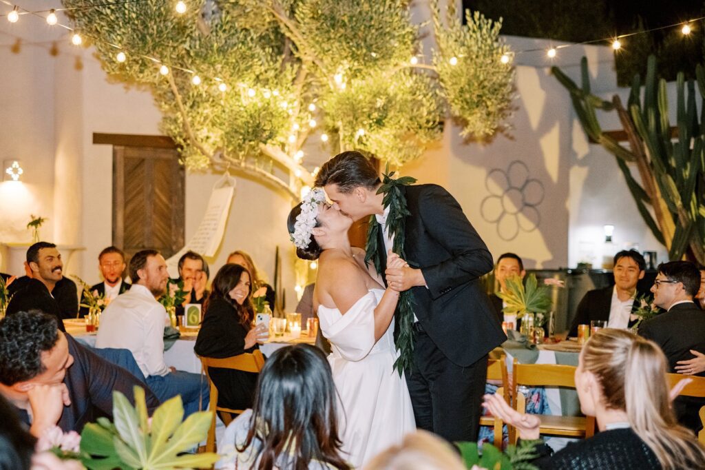 Couple kisses during first dance at Villa Leche wedding by Palm Springs Wedding Photographer Austyn Elizabeth Photography