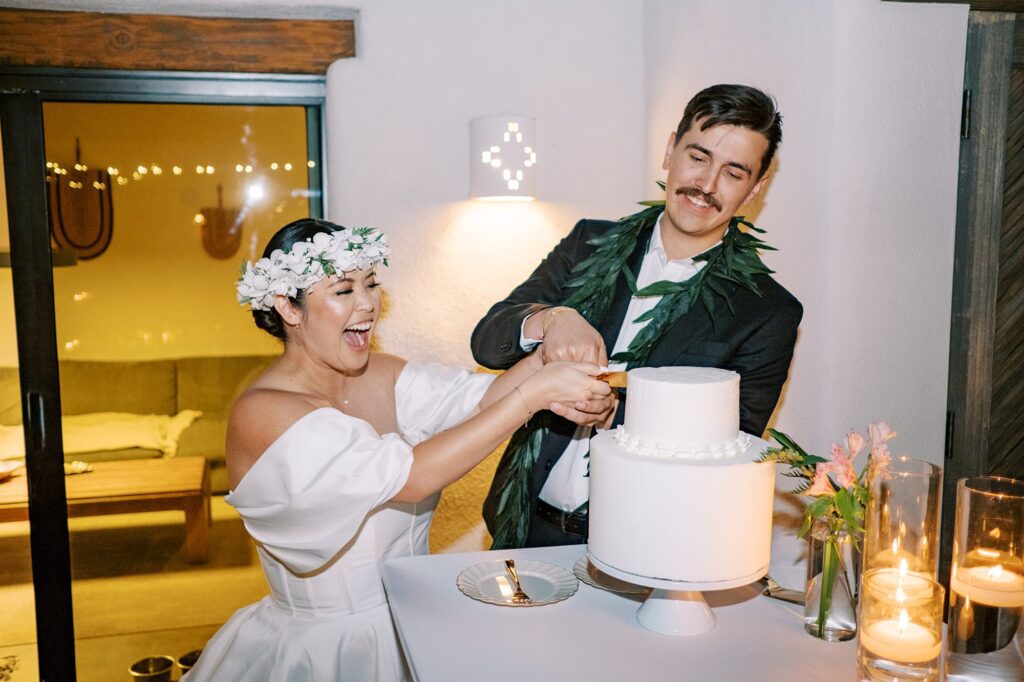 Couple cut cake at Villa Leche wedding by Palm Springs Wedding Photographer Austyn Elizabeth Photography
