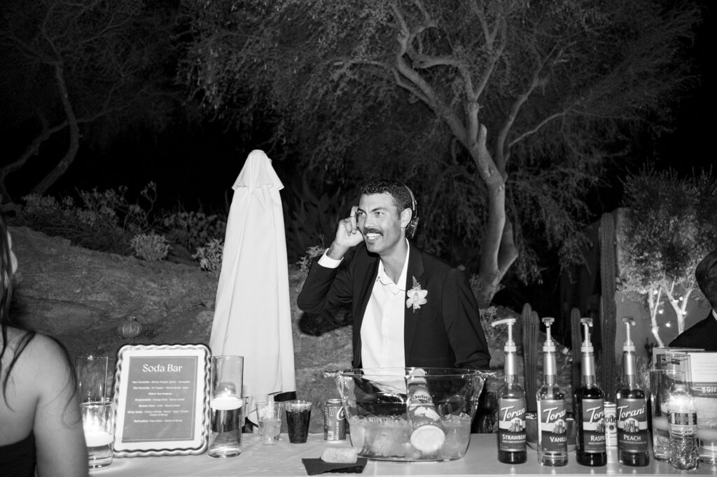 Groomsmen runs silent disco and soda bar during reception at Villa Leche wedding by Palm Springs Wedding Photographer Austyn Elizabeth Photography