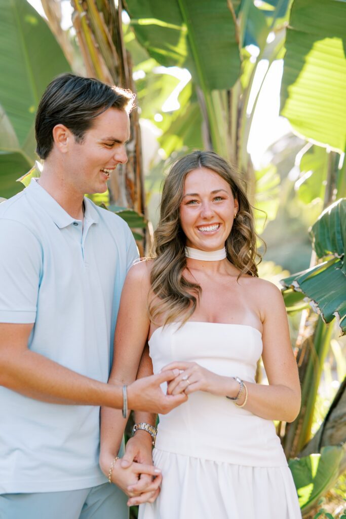 Couple giggle and laugh with authentic expressions during Descanso Beach Catalina island Engagement session by Catalina Island Photographer Austyn Elizabeth