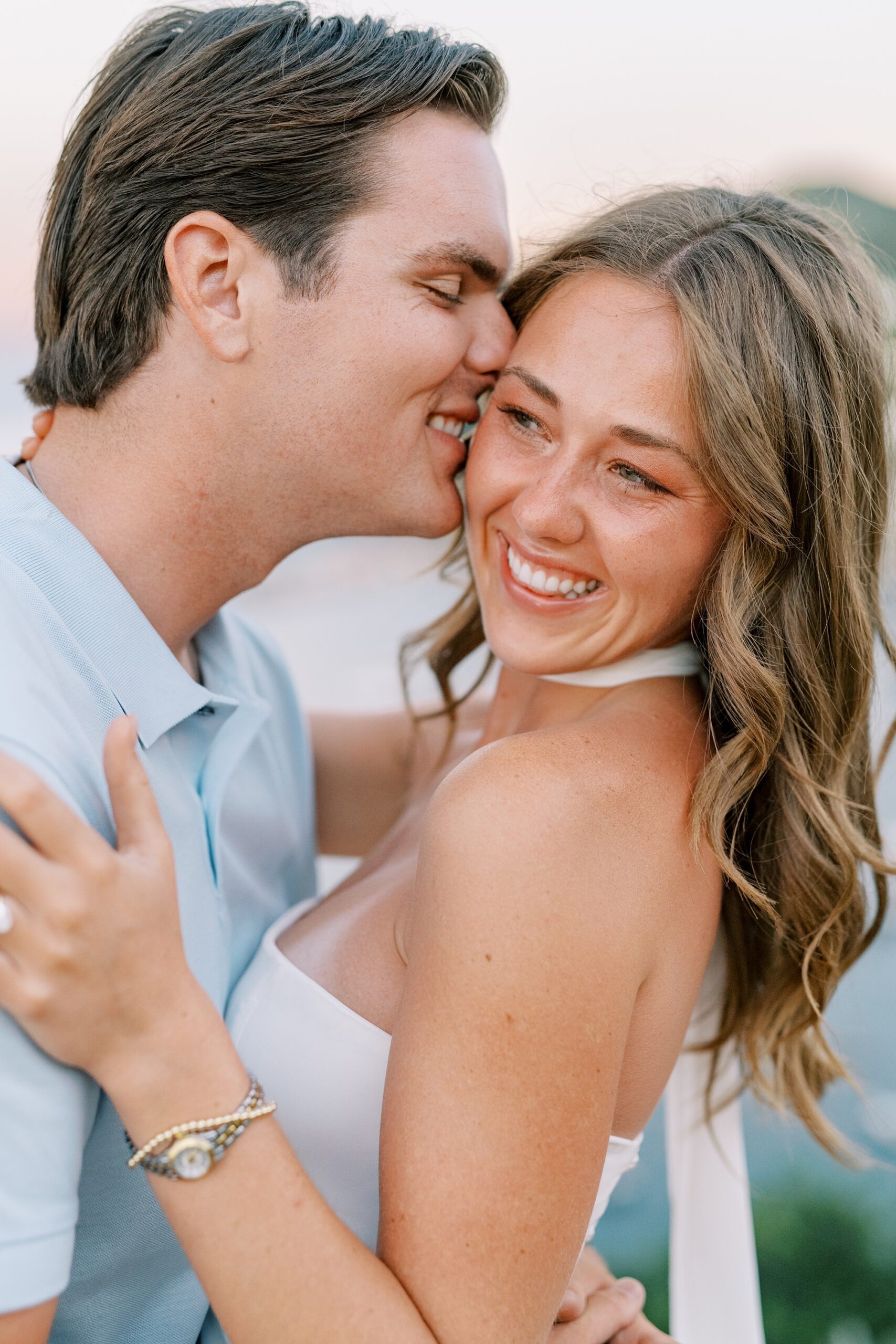 Couple snuggle during catalina island engagement by Avalon wedding photographer Austyn Elizabeth