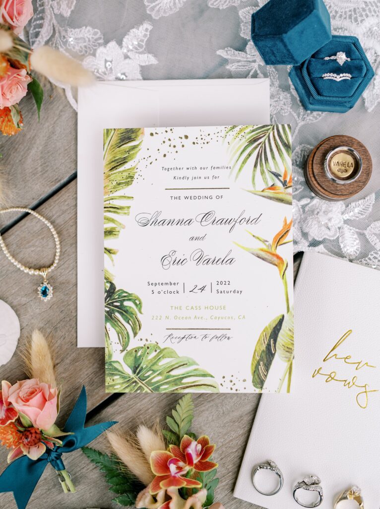 Wedding invitations along with rings and jewelry by Cayucos Wedding Photographer on Film by Austyn Elizabeth Photography