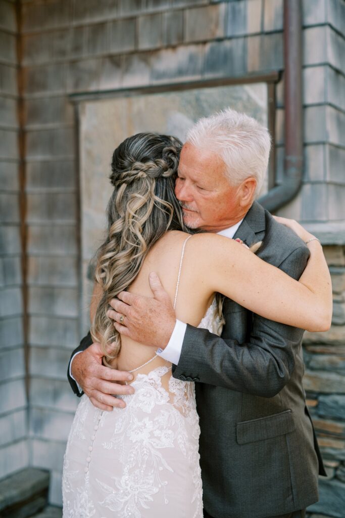 Dad hugging bride by Cayucos Wedding Photographer on Film by Austyn Elizabeth Photography