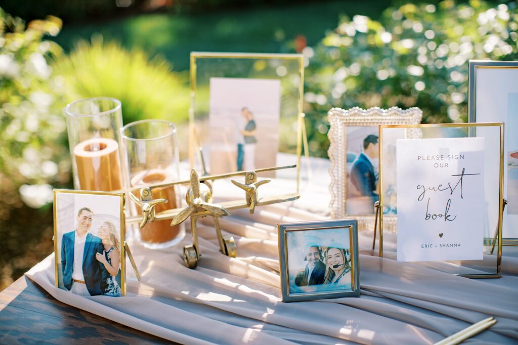 Welcome wedding table with gold frames from airport engagement session by Cayucos Wedding Photographer on Film by Austyn Elizabeth Photography