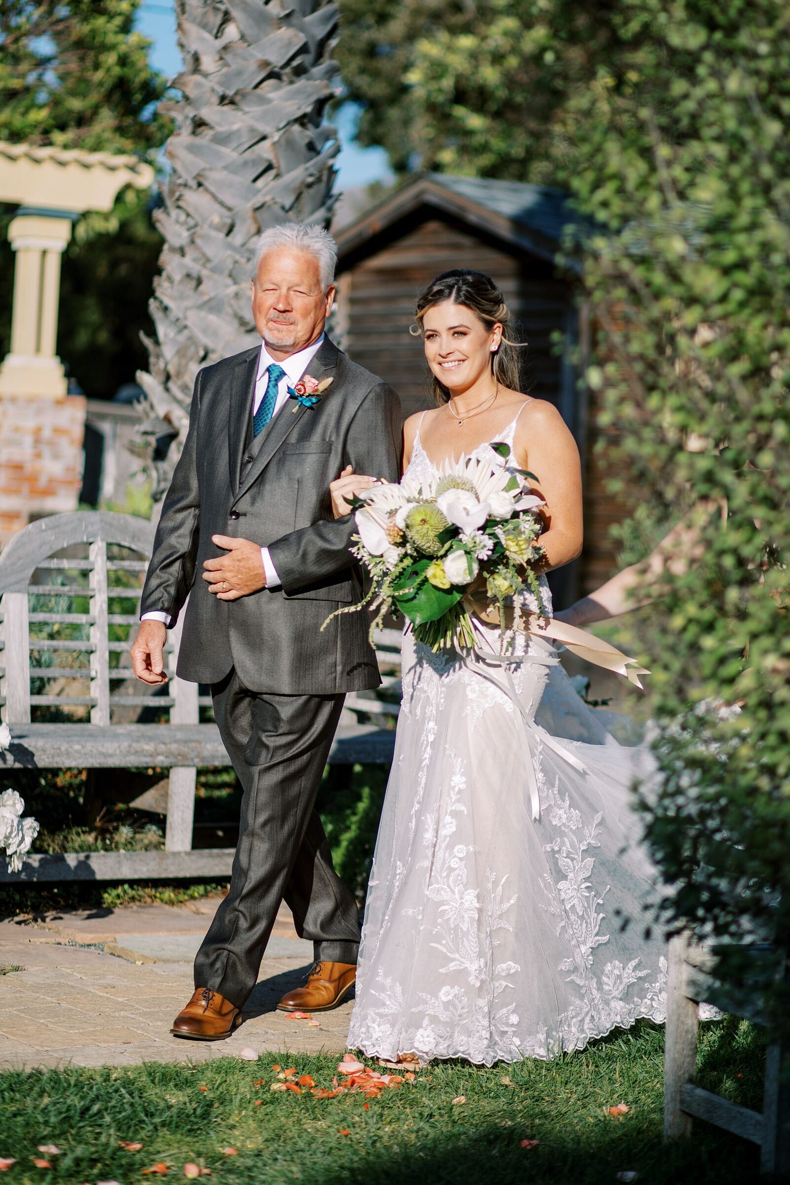 Dad and bride walk down the aisle by Cayucos Wedding Photographer on Film by Austyn Elizabeth Photography