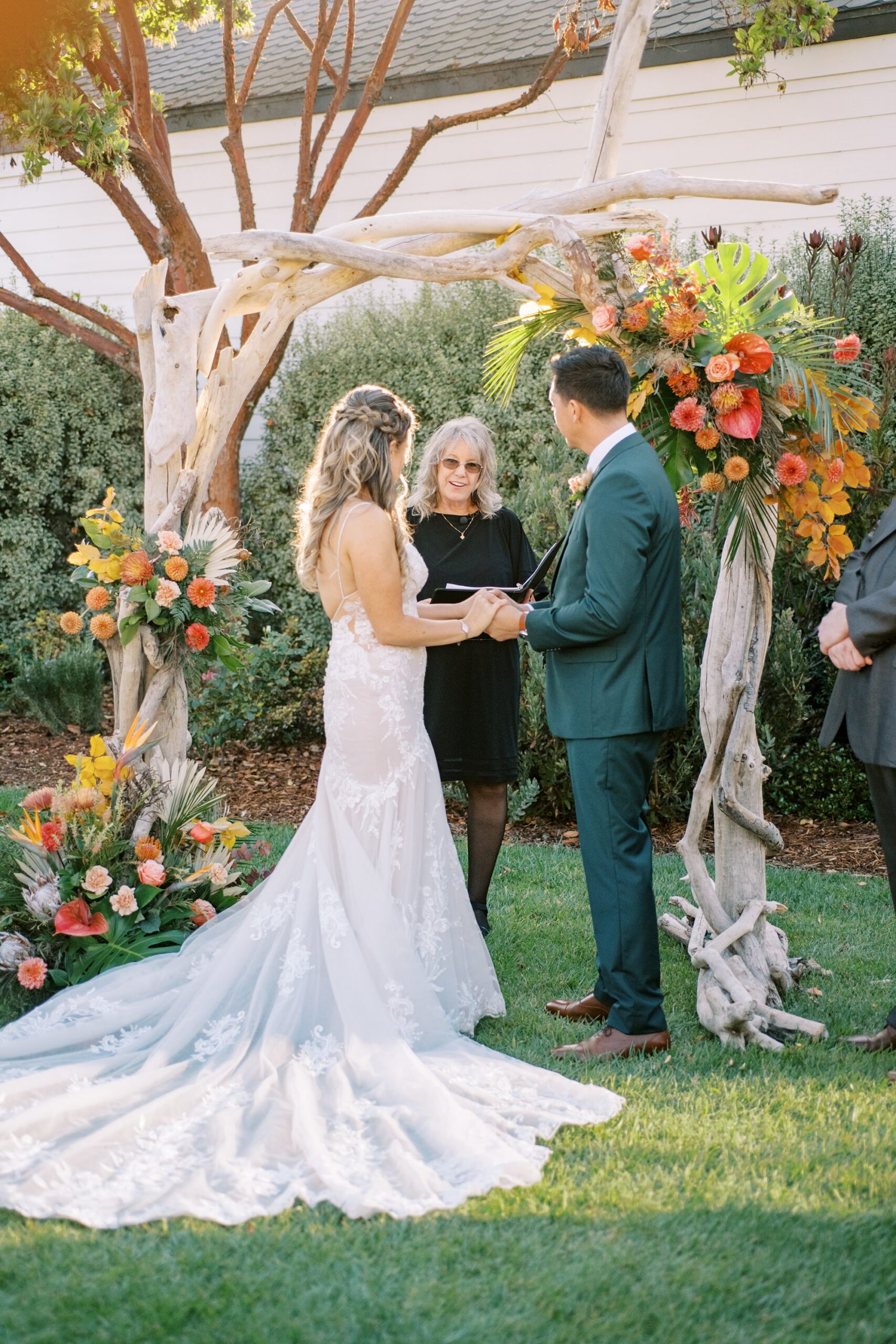 bride's godmother officiates wedding ceremony by Cayucos Wedding Photographer on Film by Austyn Elizabeth Photography
