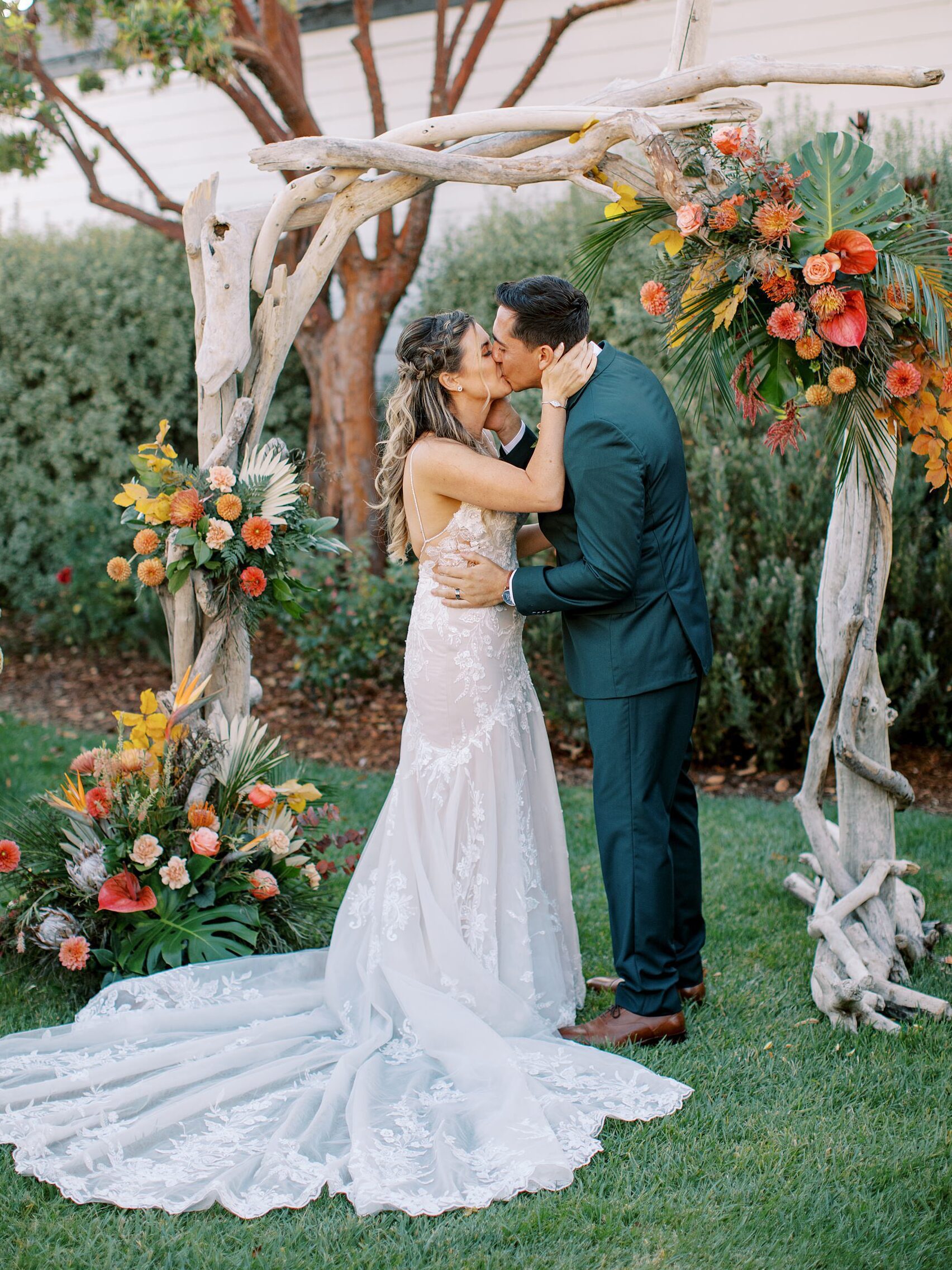 Couple kisses during wedding ceremony by Cayucos Wedding Photographer on Film by Austyn Elizabeth Photography