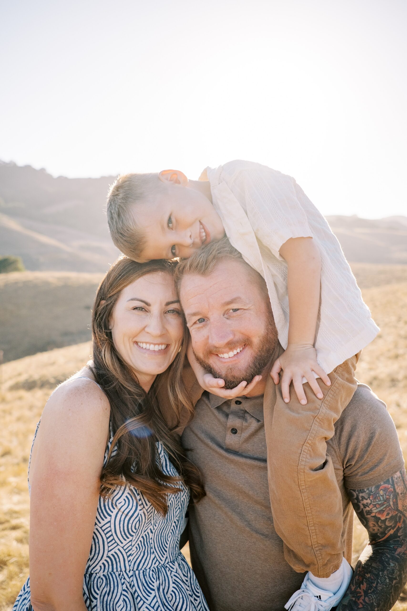 Blue brown camel and cream family photo outfit ideas at San Luis Obispo family photos at Johnson Ranch Trail by Pismo Beach Family Photographer Austyn Elizabeth Photography