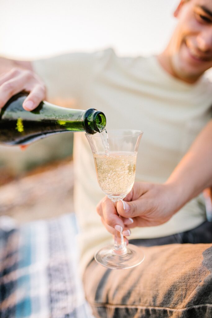 Engagement session champagne by Pismo Beach Engagement Photographer Austyn Elizabeth Photography