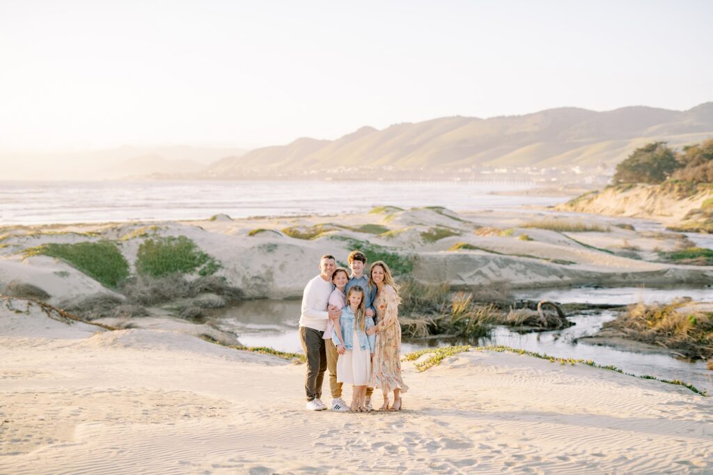 Family of five in cream, pink, blue and peach in Pismo Beach by Pismo Beach Family Photographer Austyn Elizabeth Photography