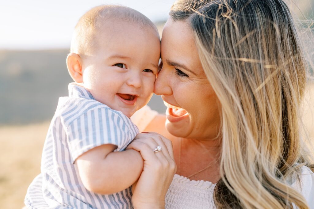 Baby laughing with mommy during golden hour Bishop Peak family photos by San Luis Obispo Family Photographer Austyn Elizabeth Photography 